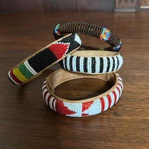 Four Absolutely amazing beaded bracelets.